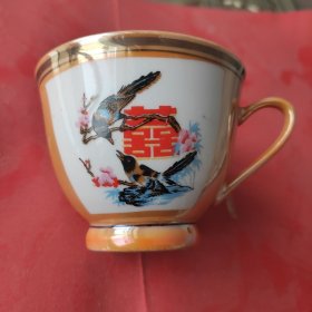 六七十年代喜鹊登梅描金茶碗。