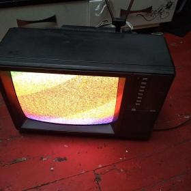 昆仑牌彩色电视机，型号：375。