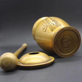 黄铜刻字人物捣药罐