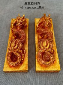 旧藏，铜鎏金浮雕龙纹镇尺一对。