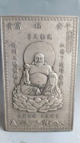 一个漂亮银佛像牌子