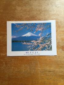 日本富士山实寄明信片一枚。樱花雪山图。非常漂亮。2016年由日本东京新宿寄中国浙江温州。贴有一枚日本卡通邮票，盖东京新宿销戳。小学生字体。好品。实图发货。