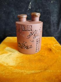 湖南蚩尤酒厂出品紫砂陶瓷蚩尤小酒瓶一套，09年的里面是空瓶，品相如图，喜欢收藏的朋友来结缘。