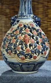 旧藏 识款【大元国至正元年九月】青花釉里红捏塑两面开窗兽首堆塑蒜头瓶一对，此瓶捏塑工艺精美，寓意一鸣惊人，胎体厚重感十足，保存完整，尺寸见图一