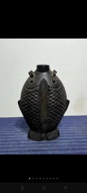 清代，陶制双鱼插花瓶一件，造型独特，雕工精细，皮壳包浆浑厚。尺寸如图
