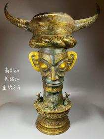 旧藏•三星堆措金“人面牛王鼓”
尺寸：高81cm长60cm重35.8斤