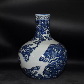 明青花留白海水龙纹天球瓶