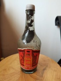 鹿龟老酒瓶一个，有标，处理