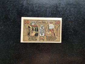 德国1921年点线齿1马克纸币 品相如图，非常稀少特殊的纸币，它是两张50芬尼由中间的点线齿连接成1马克面值，使用的时候可以自行撕开，也可以直接使用，非常有意思。保真，包挂号，非假不退