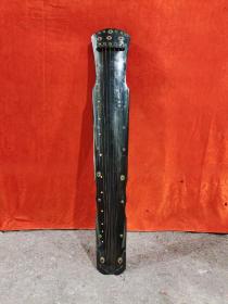 珍藏黑檀木镶宝石弹拨乐器《古琴》
尺寸：长123CM，宽21CM
重量：约3.5斤