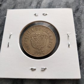 哥伦比亚1992年安第斯山鹰100比索黄铜币