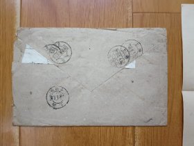 1958年邮政公事实寄封，内装北京邮电学院（今北京邮电大学）录取通知书、新生报到时间及注意事项、北京邮电学院回执（方便部分学生延期报到），实物拍照。