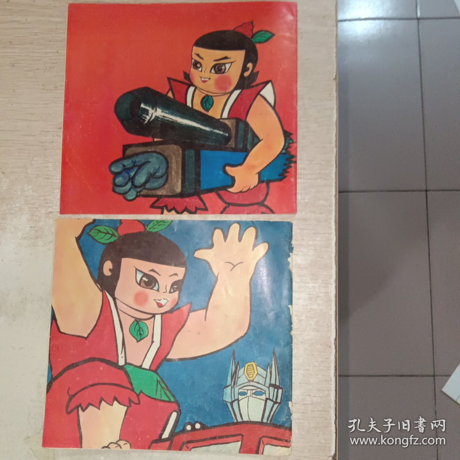 金刚葫芦娃大战变形金刚 巧救汽车人+制服霸天虎 2本合售，有一本书脊有点烂，见图