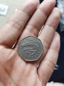 巴巴多斯1989年一元多边形币一枚
品相如图，保真，包挂号，非假不退