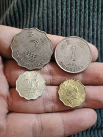 4枚老港币合售，1993年二元，1994年1元，1991年花边二毫，1994年花边二毫，品相好。