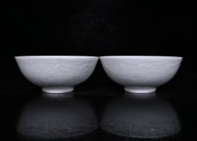 大明永乐白瓷薄胎雕刻龙凤碗