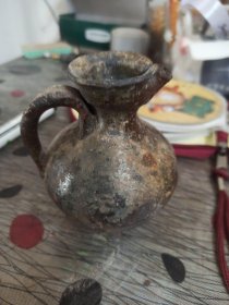 古代鸡首壶。酒壶。