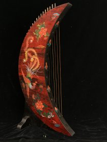 古代乐器桐木漆器月牙古筝 高90厘米 宽45厘米 厚25厘米 重3000克