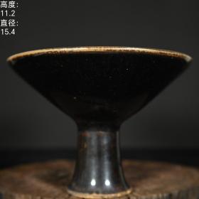 宋代吉州窑黑釉树叶纹一夜成名高脚碗。