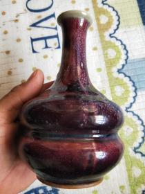 五六十年代钧窑瓶。高15厘米。直径9.3厘米。品相如图
