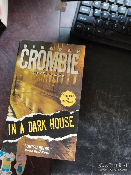 DEBORAH CROMBIE IN A DARK HOUSE