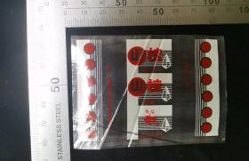 糖纸糖贴:山楂软糖糖纸01,红色山楂图案,辽宁,抚顺市食品厂,塑料糖纸,8×6厘米,gyx22200.31