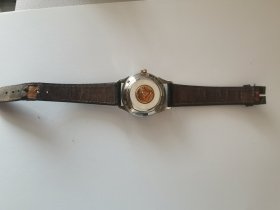 欧米茄自动老手表（能走），表面印有精密计时，官方认证。