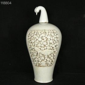 元卵白釉贴塑孔雀花卉纹梅瓶