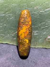 罕见黄金草花纹战国红玛瑙随形桶珠一个