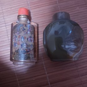 两个鼻烟壶合售放漏出一个大玛瑙一个内画瓶