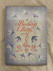 限量编号肯特签名本：A Birthday Book《生日之歌》1931年初版，布面精装本，高档缎带扉页，美国著名版画家罗克韦尔·肯特（Rockwell Kent）插图，每一页都配擦画图，限量1850册，此册编号1330，带原装硅胶书衣