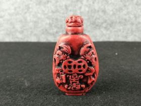 红棕石鼻烟壶，雕刻精美，包浆浑厚，品相完整，使用明显，喜欢的联系