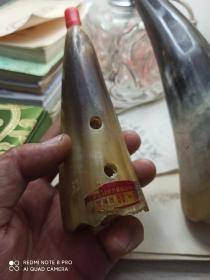 老牛角，白水牛角？牦牛角？儿童乐器。不响了