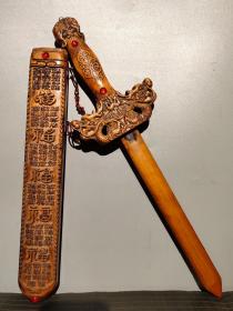 旧藏纯手工雕《百福圖》桃木剑
长60厘米，宽15厘米，厚4厘米，重600克