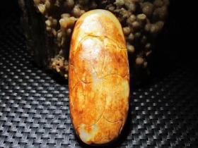 精品   正宗新疆 玉龙河  枣红皮  籽料   石中玉  独籽 俏色巧雕 达摩  大挂件  把件