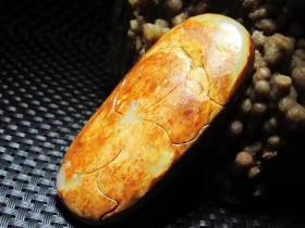 精品   正宗新疆 玉龙河  枣红皮  籽料   石中玉  独籽 俏色巧雕 达摩  大挂件  把件