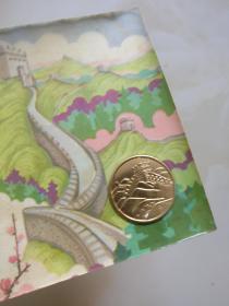 长城     图案压暗花,上有一长城金属印章,,背后地图,估计80年代,原物照相