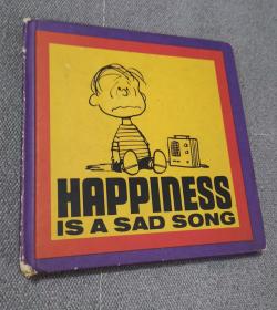 Happiness Is A Sad Song