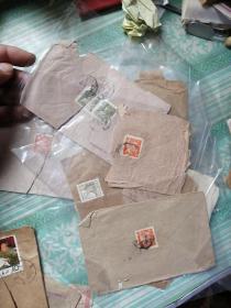 实寄封，共20个，有一枚林彪和毛泽东的实寄封，但撕破了，并且信封缺一块见最后一图。只有一个未撕见图3，其余都被撕破。有2枚邮票被撕。