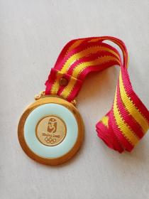 奥林匹克运动会纪念章一枚。