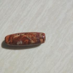 小南红玛瑙珠，一枚，，，0.7×2.6cm，