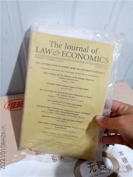 实物拍照；The Journal of LAW & ECONOMICS