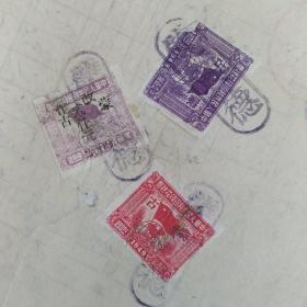 国旗地球图加盖“改作蒙古贰仟元”和印蒙古100元，200元税票共3枚（1951年海拉尔税务局检印座商发货票)