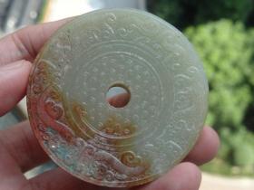 战汉时期老和田玉双面龙平安扣---包浆自然--沁色自然--老气保真尺寸：5.5x0.9cm重：57.3g喜欢的可联系