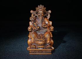 黄杨木精雕细琢财神摆件，高11厘米，宽6.7厘米，重168克。