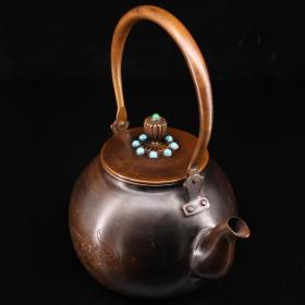 纯铜全铜茶壶 珍藏老纯紫铜纯手工打造镶嵌宝石老茶壶 
重747克  高22厘米  宽17厘米